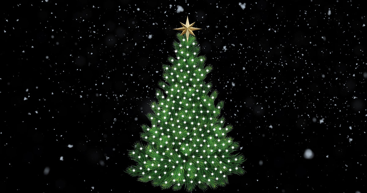 A Christmas tree in a snowy landscape, decorated with lights and a golden star on top.